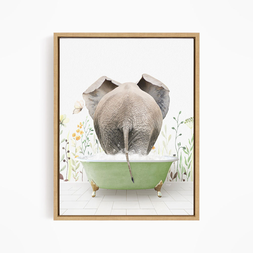 An elephant is sitting in a green bathtub filled with water, surrounded by flowers and plants.