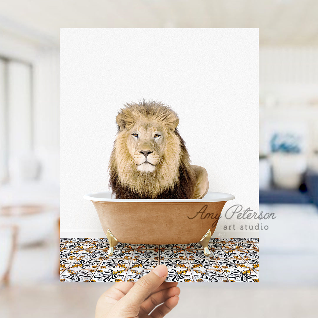 a hand holding a card with a lion in a bathtub