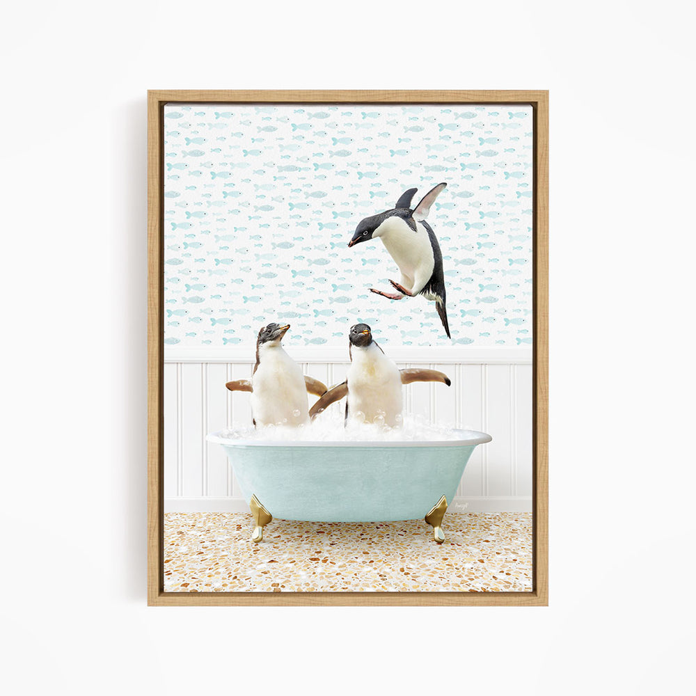A framed image depicting two penguins sitting in a bathtub, with one penguin flying towards the other penguin.