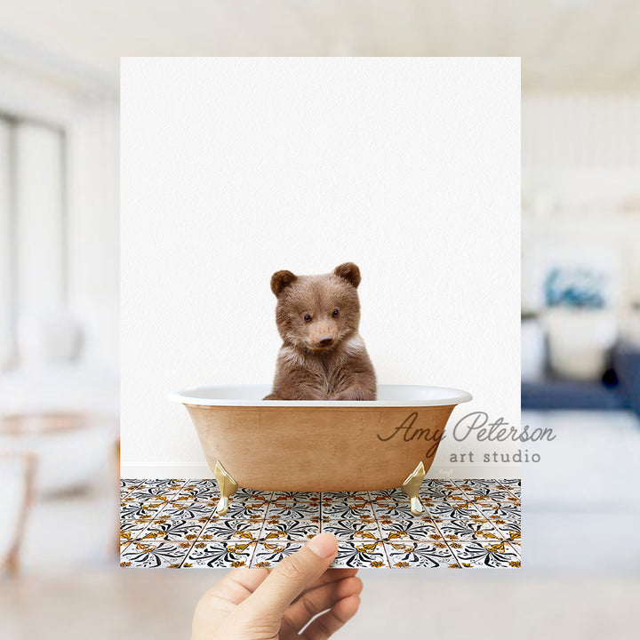 a person holding up a card with a picture of a bear in a bathtub