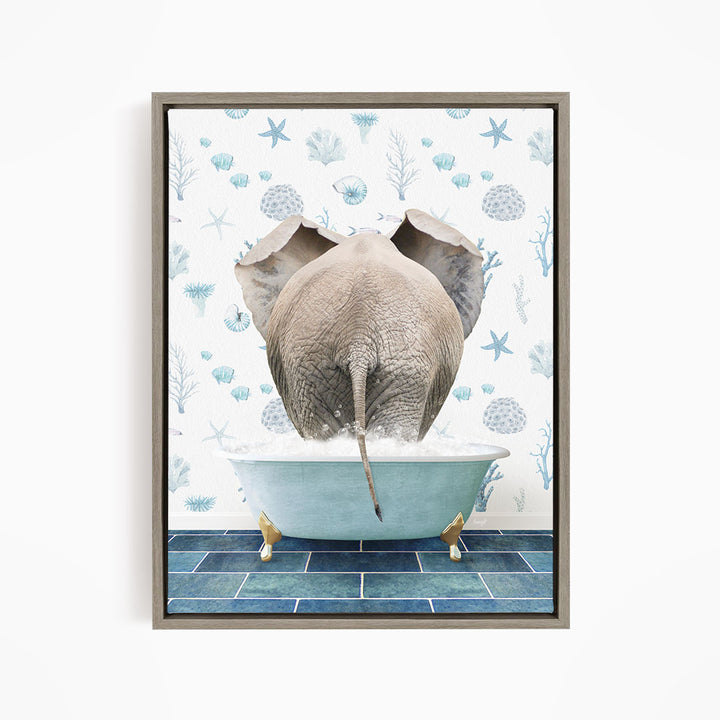 An elephant is sitting in a bathtub filled with water, surrounded by blue and white floral patterns.