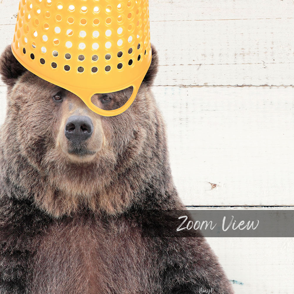 A close-up of a bear wearing a yellow plastic bucket hat, with the text "Zoom View" below the image.
