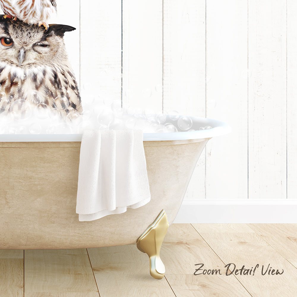 A large owl sitting in a bathtub filled with water, with a towel draped over the side.