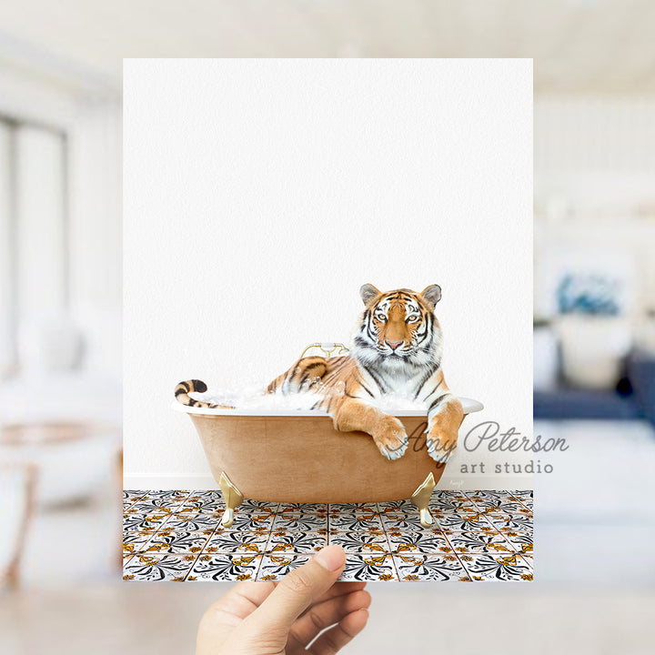 a hand holding a card with a picture of a tiger in a bathtub