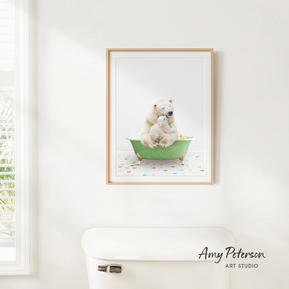 A framed image of a polar bear sitting in a green bathtub, with a window and toilet visible in the background.