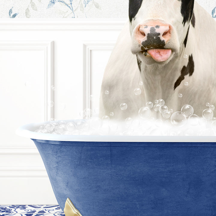 a cow sticking its tongue out in a bathtub