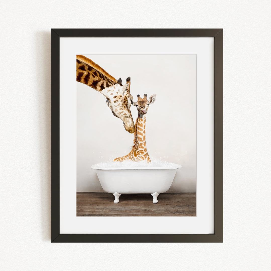 A mother giraffe and her baby giraffe are enjoying a relaxing bath together in a white bathtub.