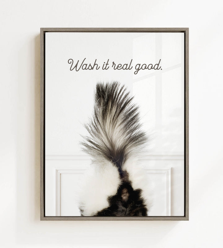 a close-up of a skunk's tail with the text "Wash it real good."