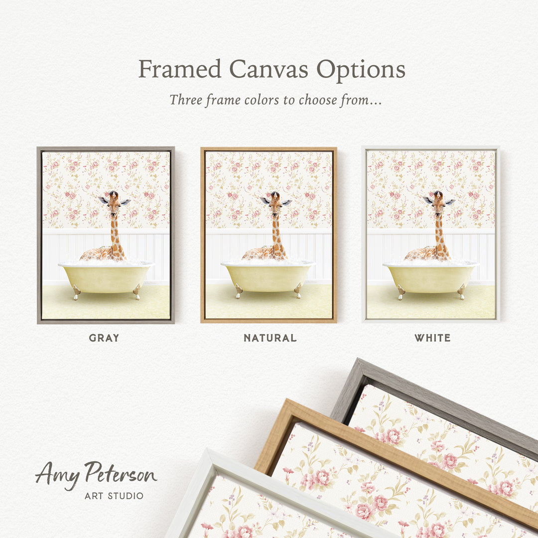 The image is a framed canvas option featuring three different framed pictures of a giraffe in a bathtub, each with a different frame color: gray, natural, and white.
