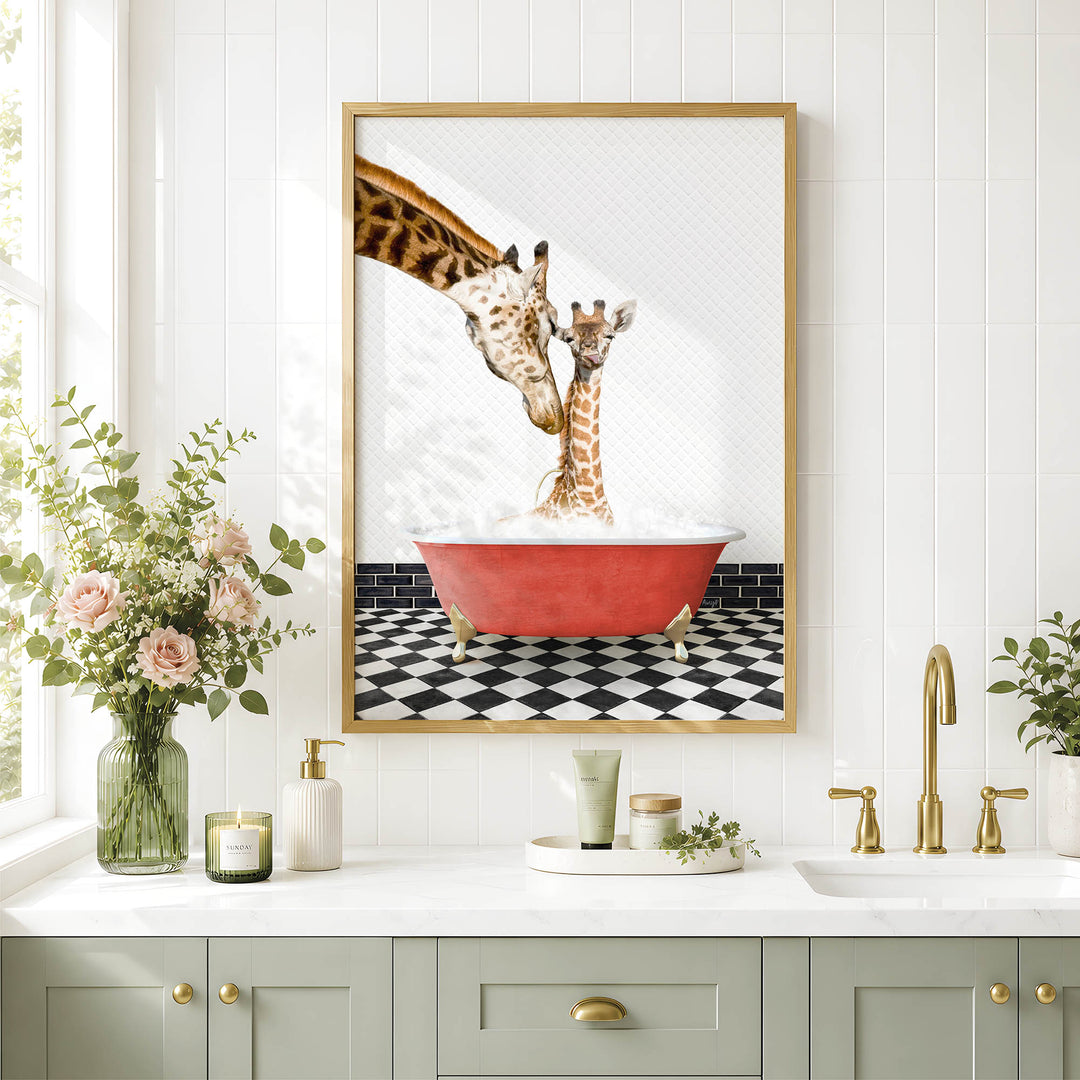 A framed image of two giraffes standing in a red bathtub, surrounded by a black and white checkered floor and a vase of pink flowers, in a bathroom setting with a sink and countertop.