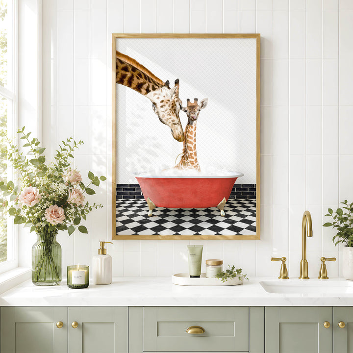 A framed image of two giraffes standing in a red bathtub, surrounded by a black and white checkered floor and a vase of pink flowers, in a bathroom setting with a sink and countertop.