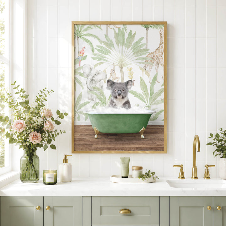 a bathroom scene with a framed picture of a koala sitting in a bathtub, surrounded by a tropical jungle wallpaper. The koala is sitting in a green bathtub with a faucet, and there are flowers and candles on the counter.