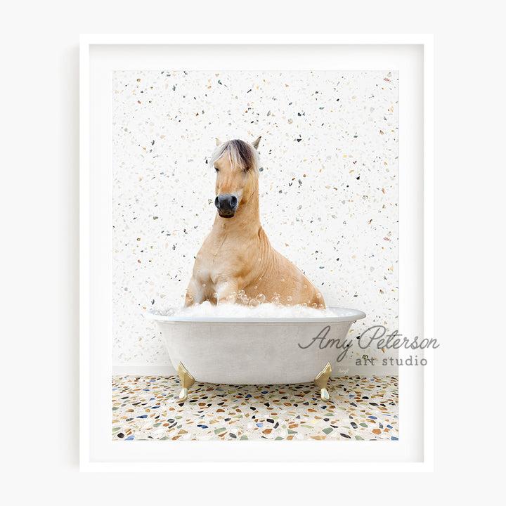 a horse is sitting in a bathtub with bubbles