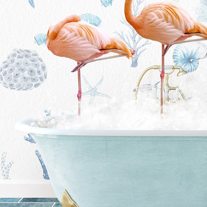 two flamingos standing in a bathtub with bubbles