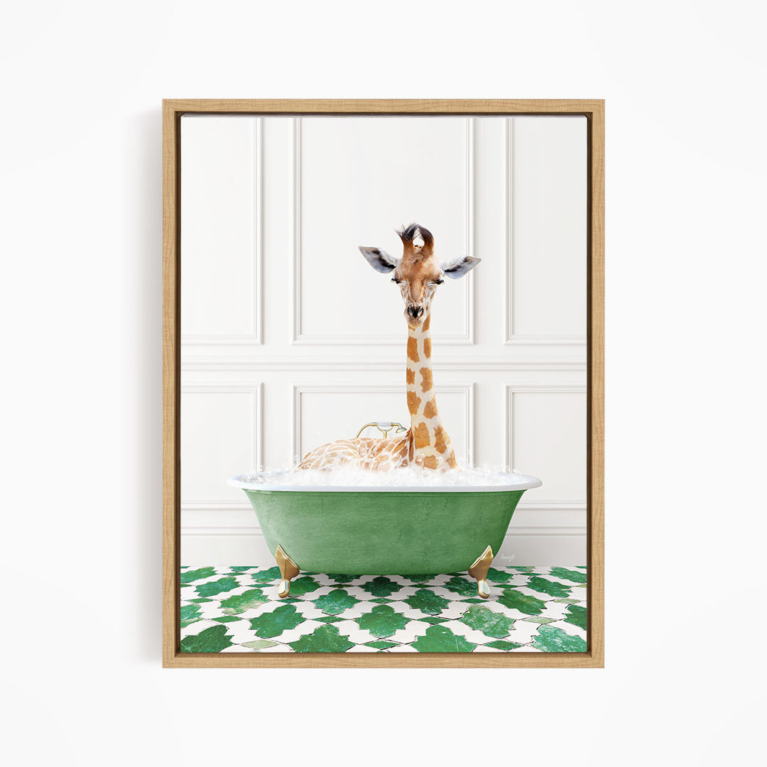 A giraffe sitting in a green bathtub filled with bubbles, with a white wall and green and white patterned floor in the background.
