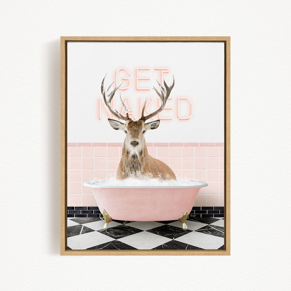 A deer with antlers is sitting in a pink bathtub, with a pink and white checkered floor and pink and white tiled wall behind it.