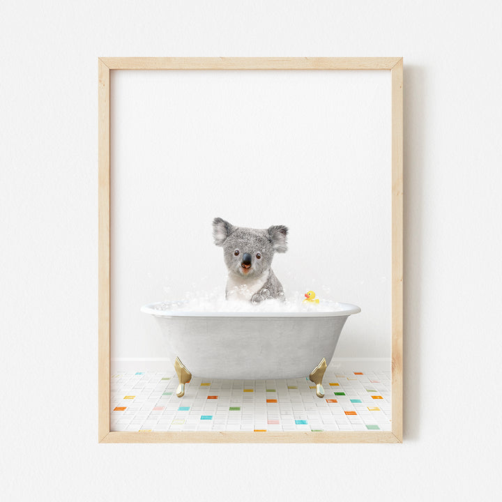 a framed photo of a koala in a bathtub