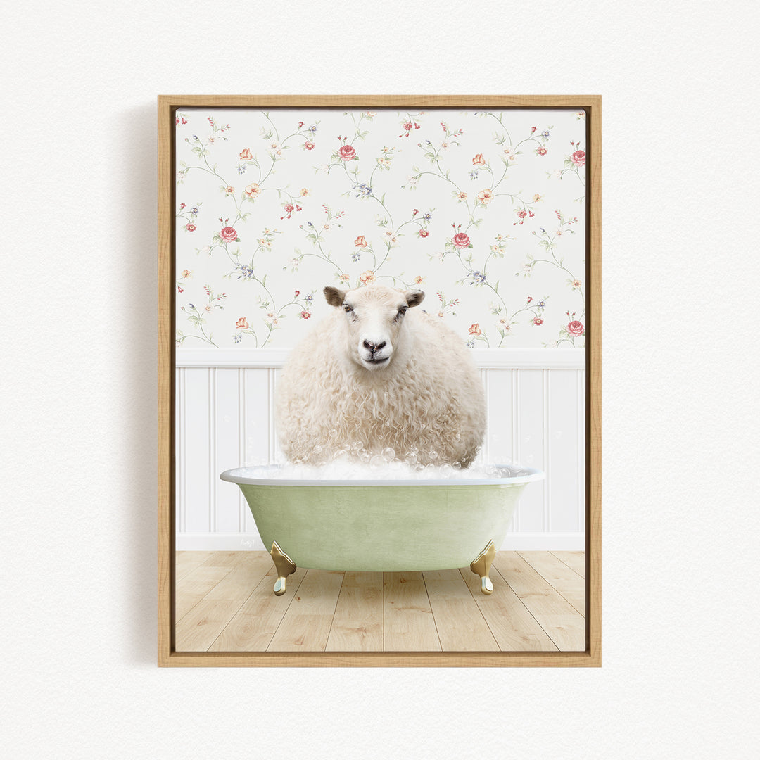 A fluffy white sheep sits in a green bathtub, surrounded by a floral wallpaper.