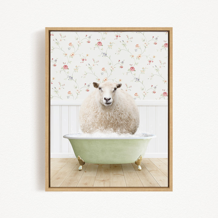 A fluffy white sheep sits in a green bathtub, surrounded by a floral wallpaper.