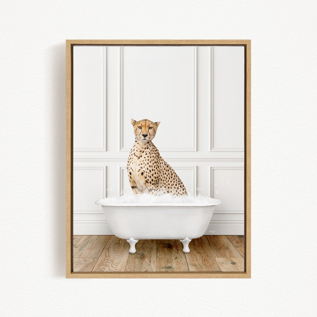 A cheetah sitting in a white bathtub filled with water, looking directly at the camera.