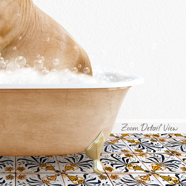 A bathtub filled with bubbles, with a gold faucet and a patterned tile floor in the background.