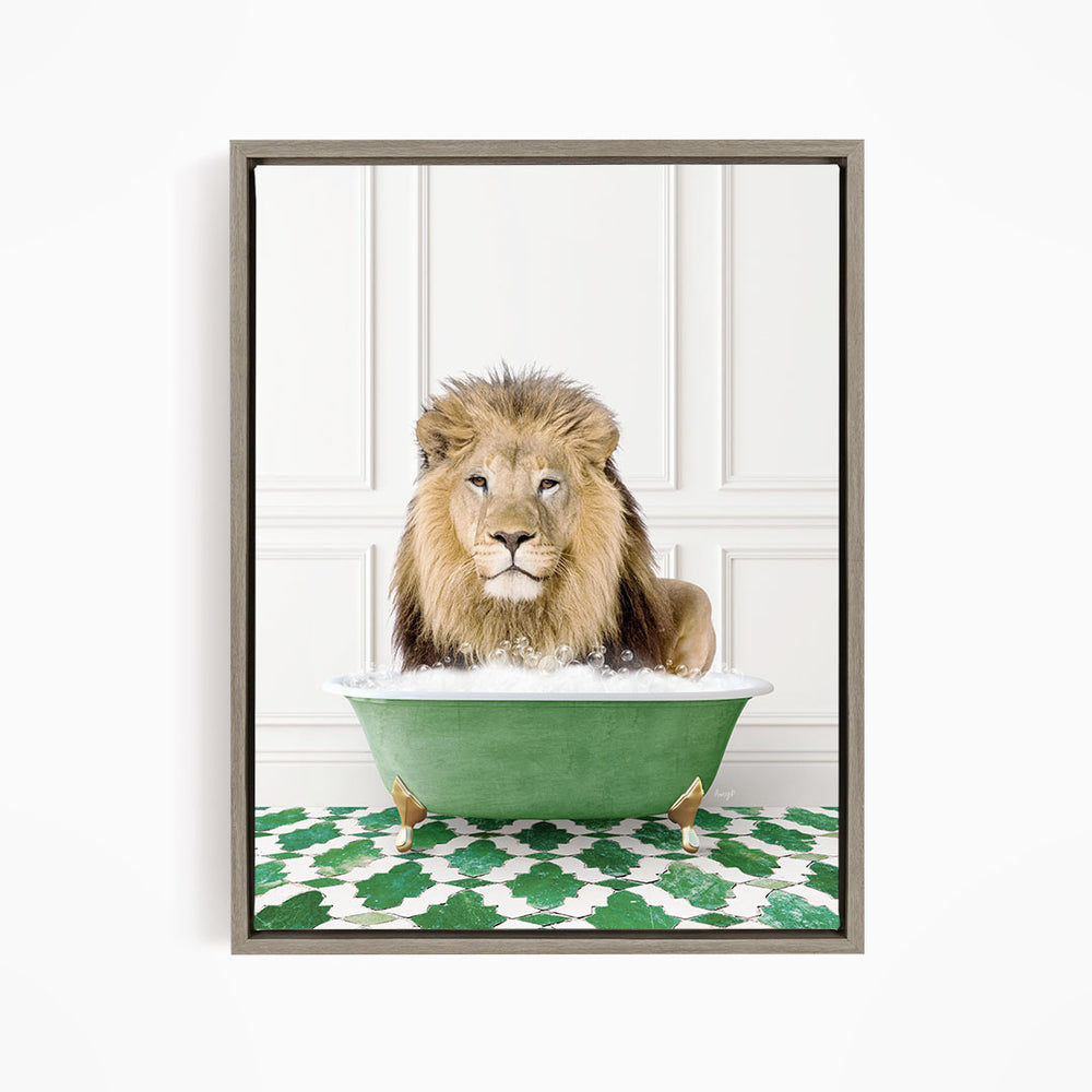 A lion sitting in a green bathtub filled with bubbles, looking directly at the camera.