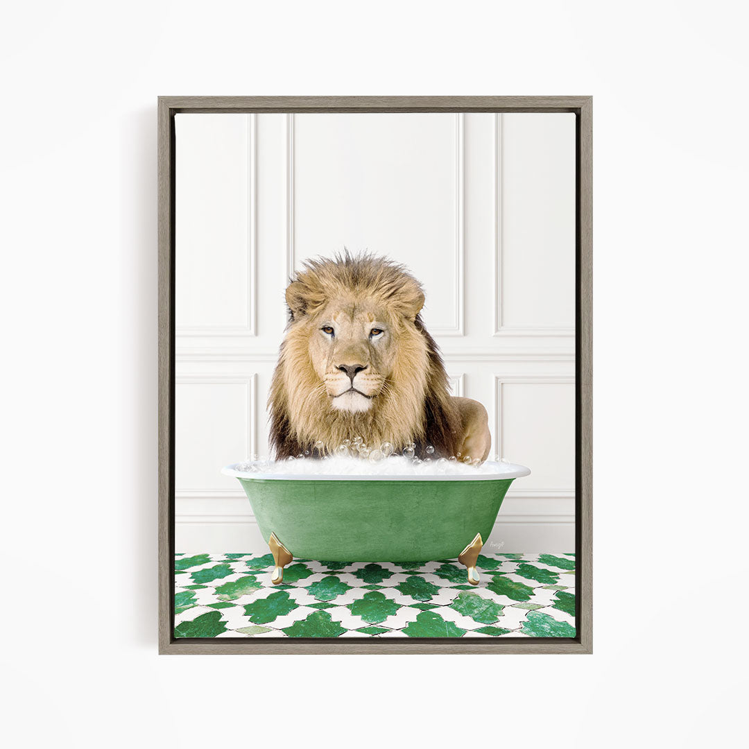A lion sitting in a green bathtub filled with bubbles, looking directly at the camera.