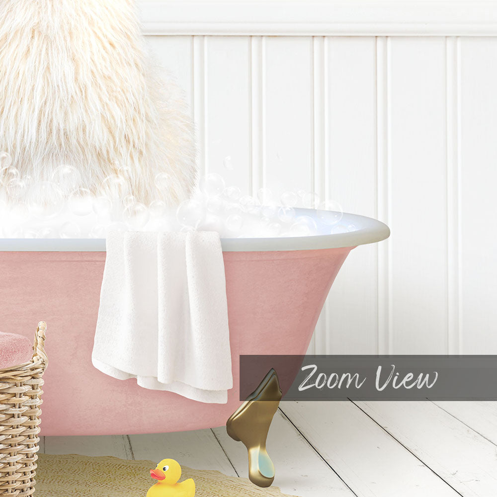 A pink bathtub filled with bubbles, with a white towel and a yellow rubber duck nearby.