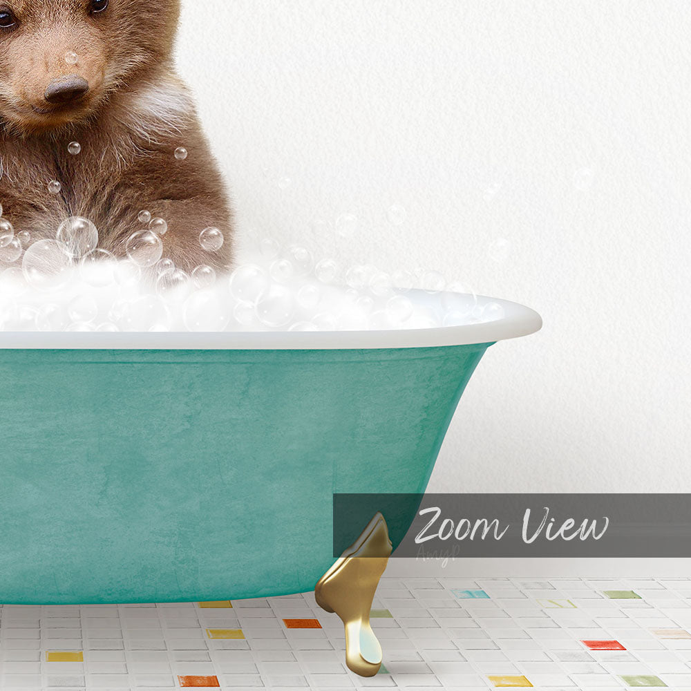 A small brown bear is sitting in a teal-colored bathtub filled with bubbles, creating a playful and whimsical scene.