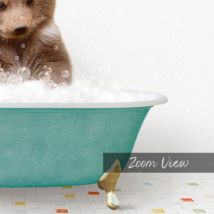 A small brown bear is sitting in a teal-colored bathtub filled with bubbles, creating a playful and whimsical scene.