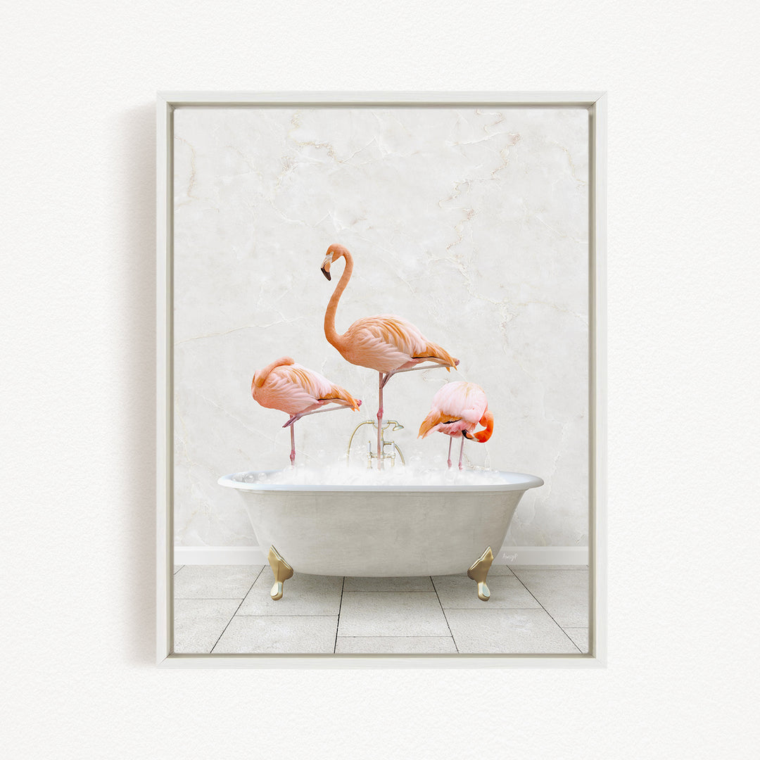 A framed image depicting three flamingos standing in a white bathtub filled with water.