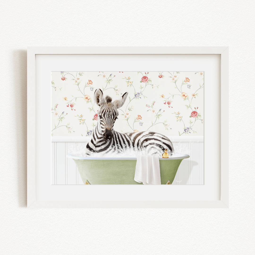A zebra is sitting in a green bathtub filled with water, surrounded by a floral wallpaper.