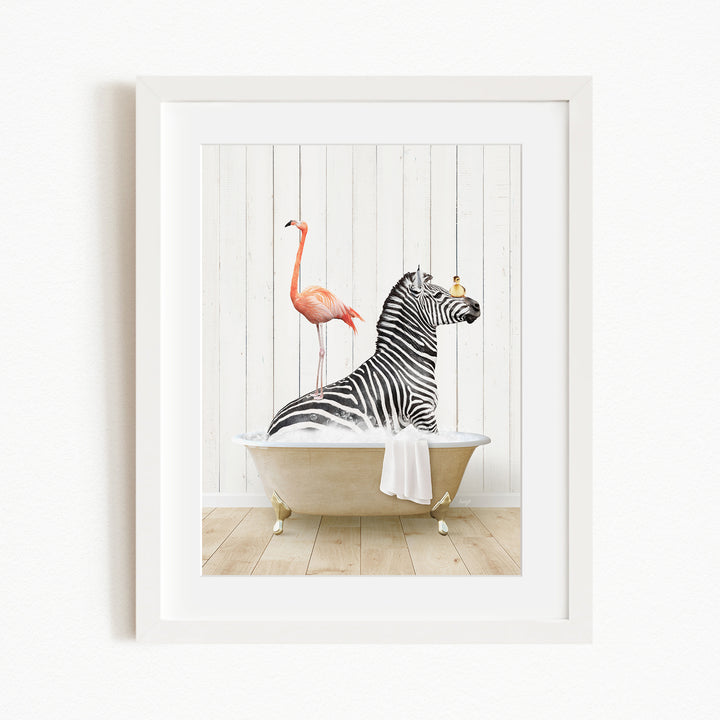 A framed image depicting a zebra sitting in a bathtub, with a flamingo standing on its back and a bird perched on its head.