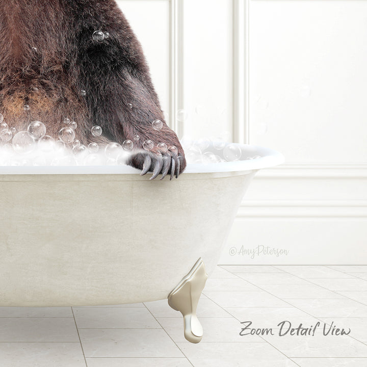 A close-up of a bear's paw in a bathtub filled with bubbles, with a white wall and tiled floor in the background.