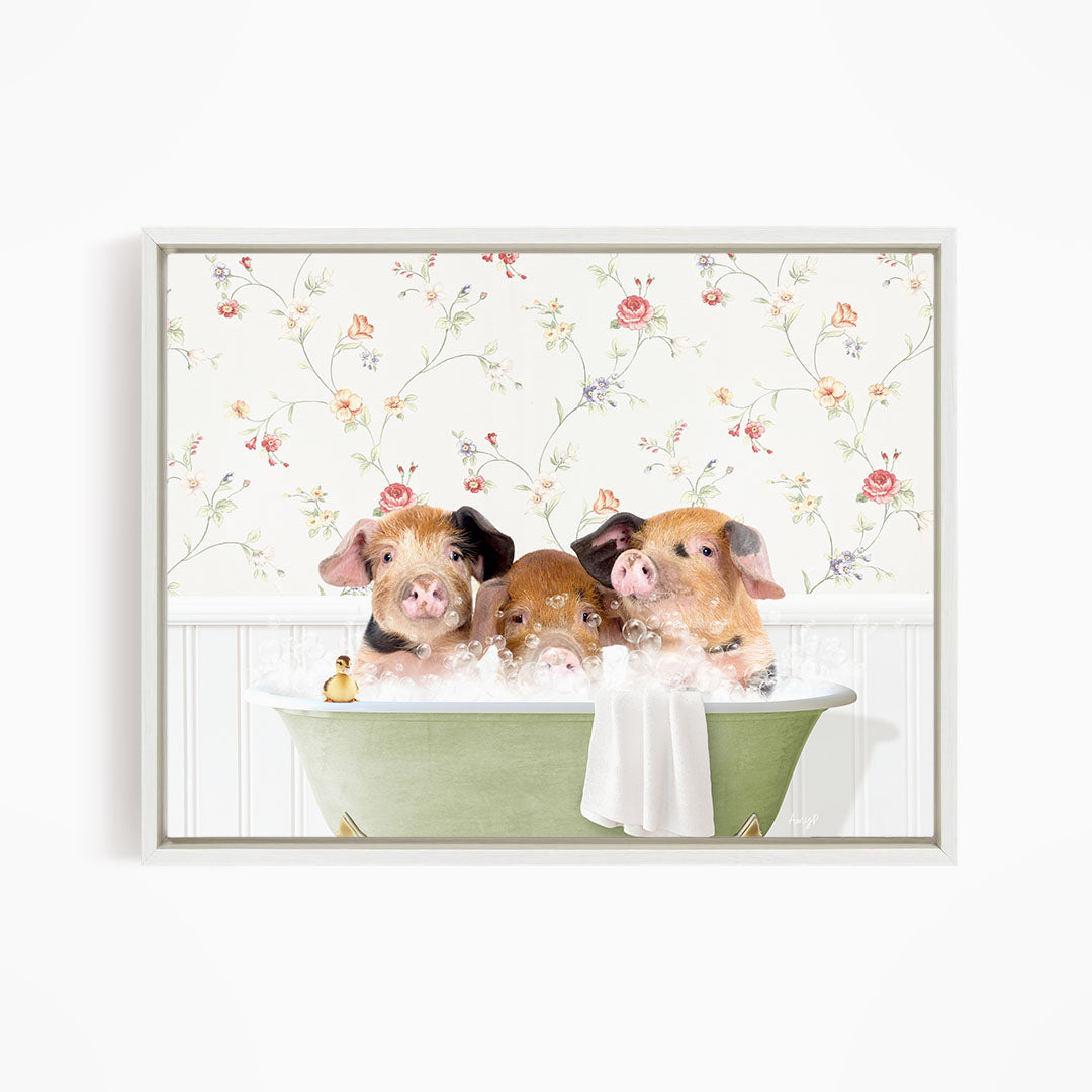 Three adorable pigs sitting in a green bathtub, enjoying a bubble bath.