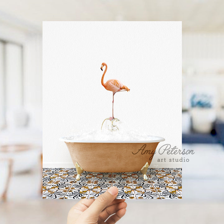 a pink flamingo standing on top of a bath tub