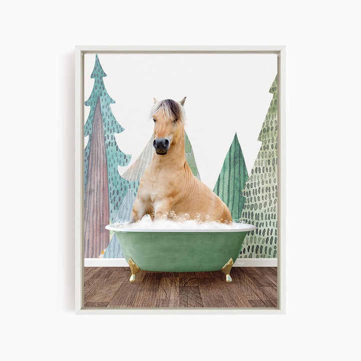A light brown horse is sitting in a green bathtub, surrounded by a forest-themed background with trees and foliage.