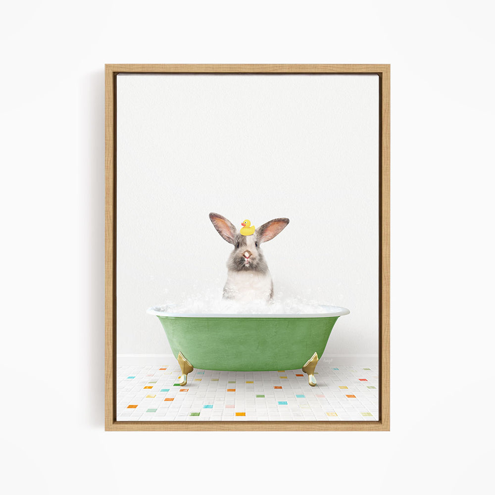 A cute rabbit sitting in a green bathtub filled with bubbles, wearing a yellow hat.
