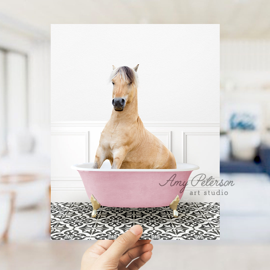 a person holding a card with a horse in a bathtub