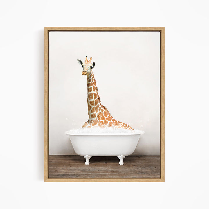 A giraffe sitting in a white bathtub filled with bubbles, creating a whimsical and playful scene.