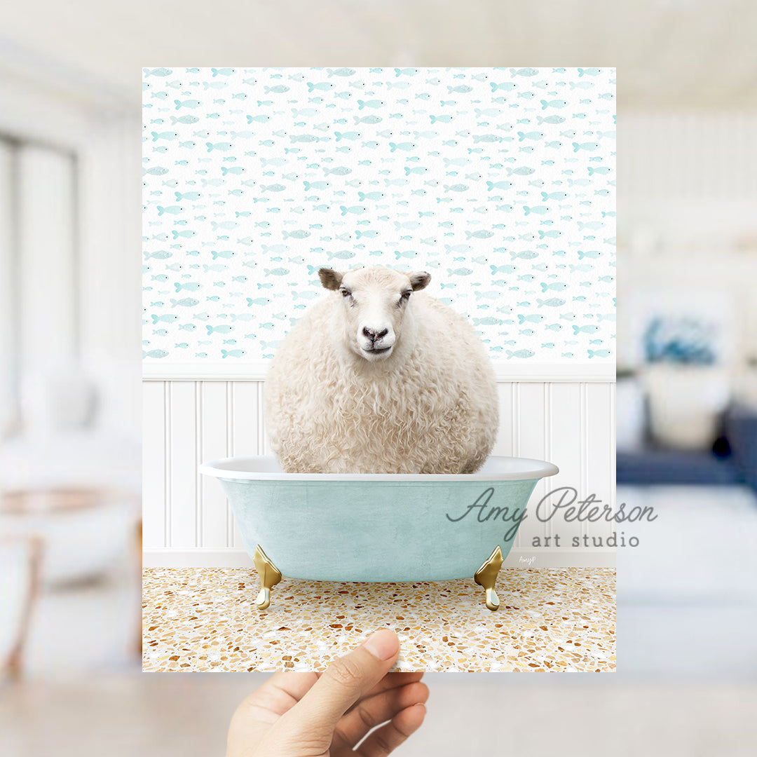 a sheep sitting in a blue bath tub