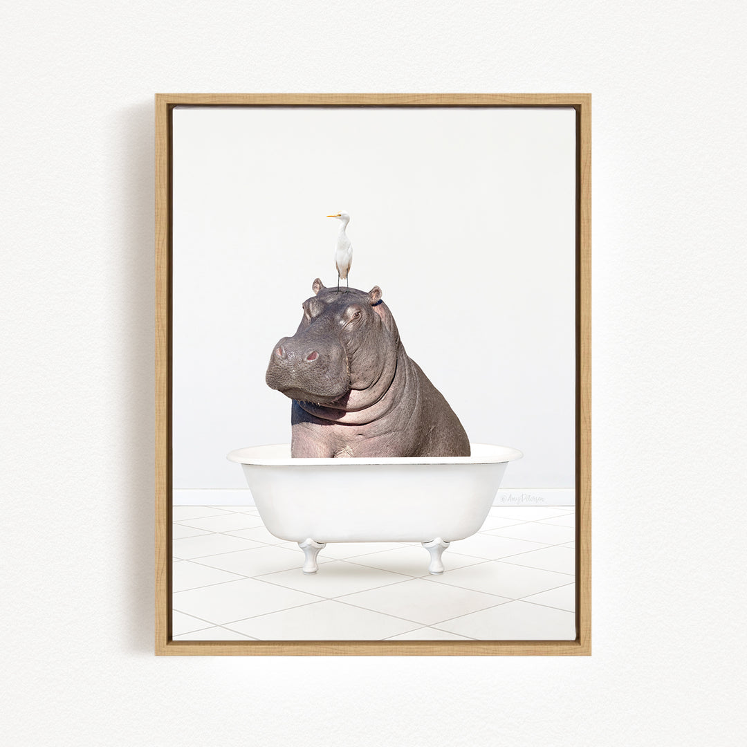 A hippopotamus sitting in a bathtub, with a bird perched on its head.