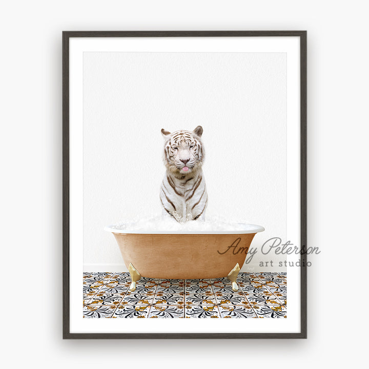 a white tiger is sitting in a bathtub