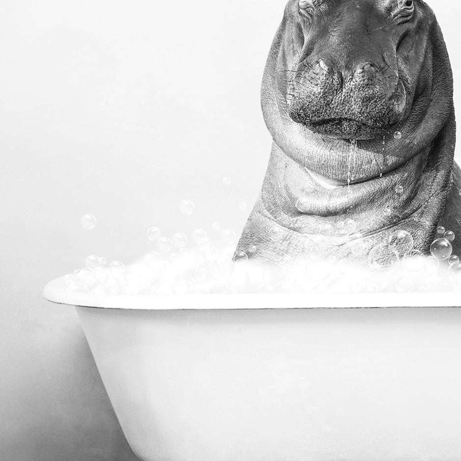 a hippo in a bathtub with bubbles coming out of it