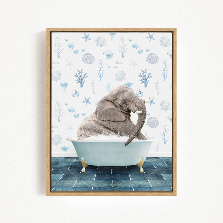 A gray elephant is sitting in a blue bathtub, surrounded by a pattern of seashells and starfish on the wall behind it.