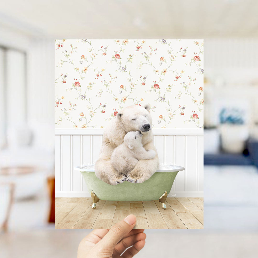 A polar bear is sitting in a green bathtub, with a baby polar bear nestled next to it, against a floral wallpaper backdrop.