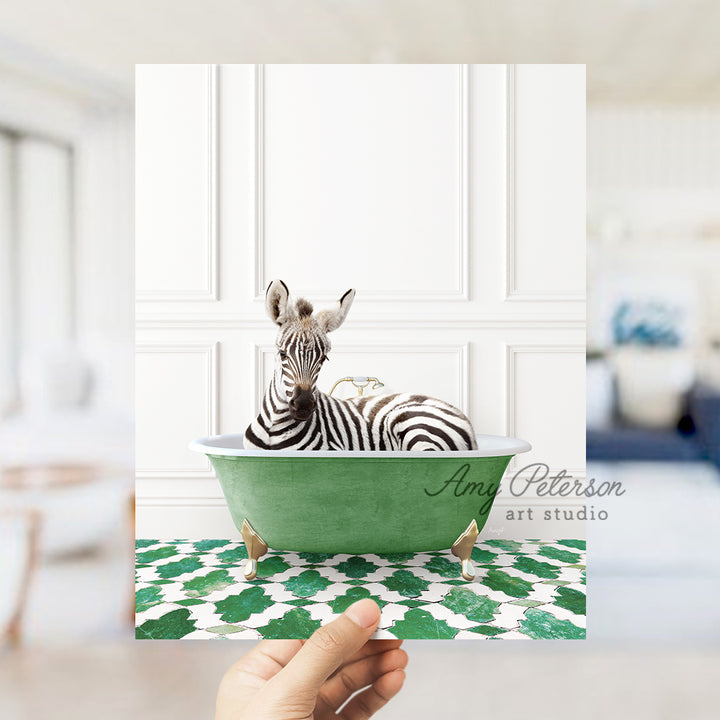 a zebra is sitting in a green bathtub