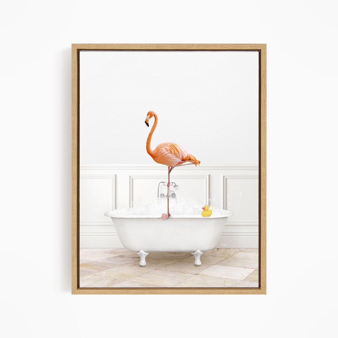A pink flamingo stands on one leg in a white bathtub filled with water, with a yellow rubber duck floating nearby.