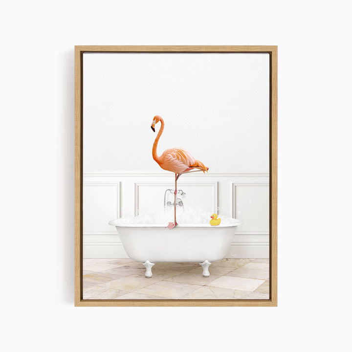 A pink flamingo stands on one leg in a white bathtub filled with water, with a yellow rubber duck floating nearby.