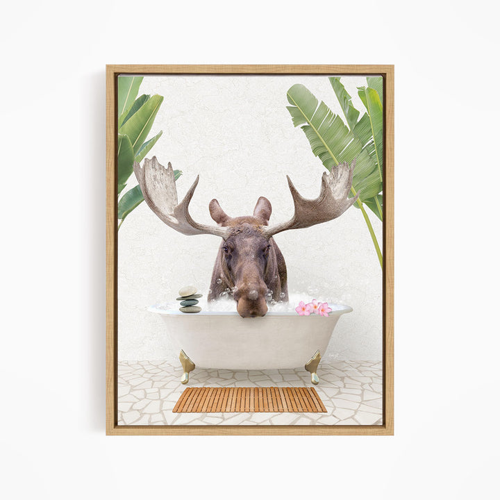 A moose with large antlers is sitting in a bathtub filled with water, surrounded by tropical plants and flowers.